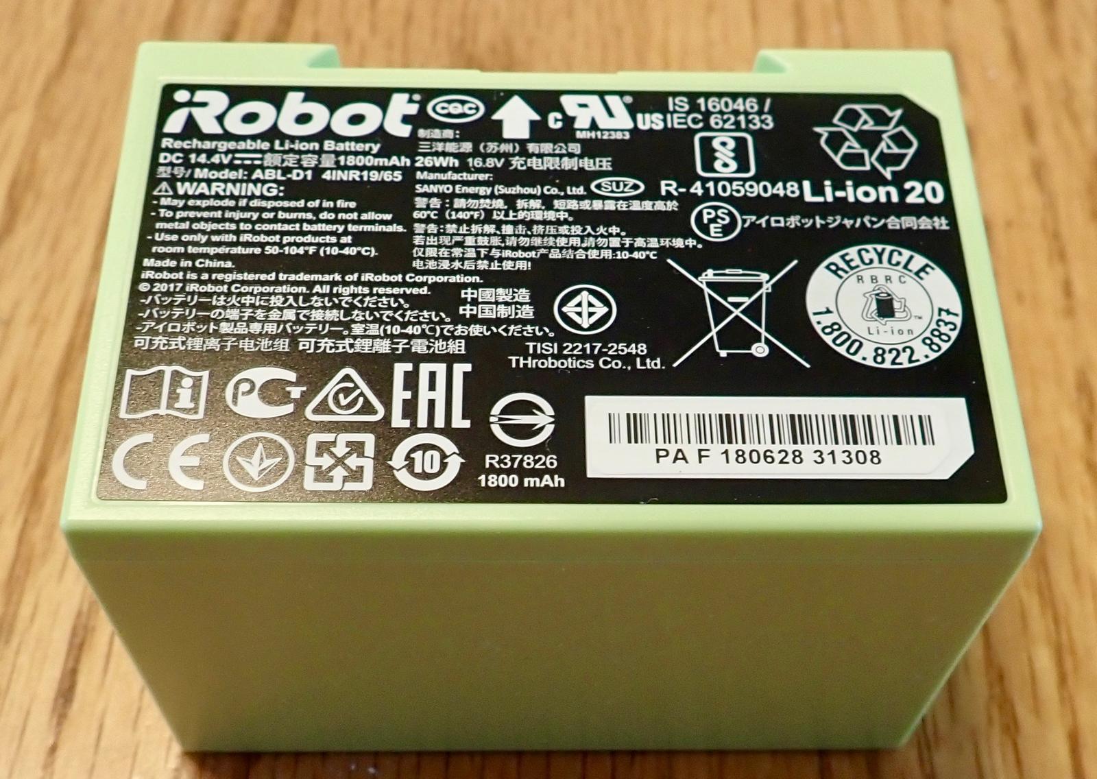 Roomba i7 Teardown: Why is there a waving cat with a lint roller inside?